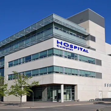 A hospital building with the word " hospital " on it.
